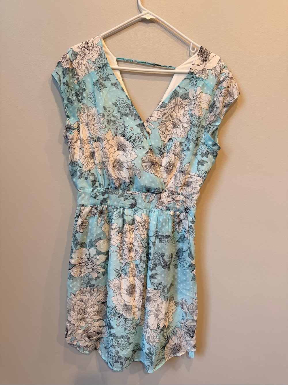 Daniel Rainn Floral Mini Dress with Packets side zipper and clasp on chest